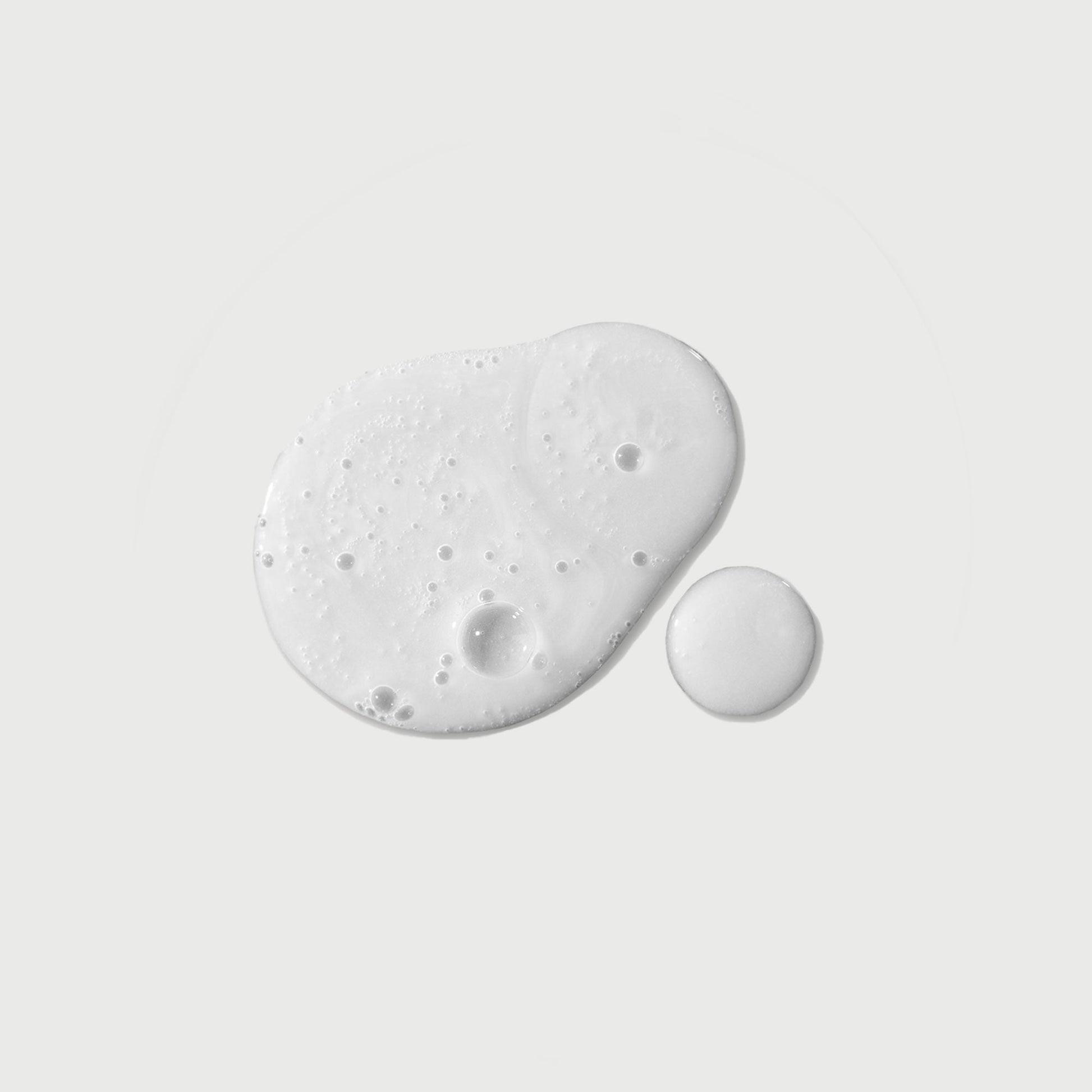 the-purifier-niacinamide-serum-body-wash-n9 NATR-40012-Swatch-The-Purifier-Niacinamide-Serum-Body-Wash-bonebkgd.jpg